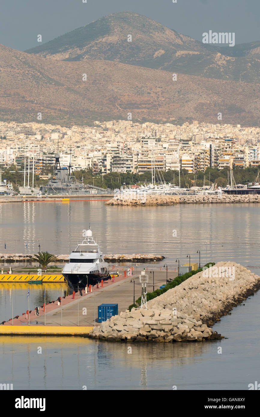 Port of Kastella at Piraeus with a boat in it. Stock Photo