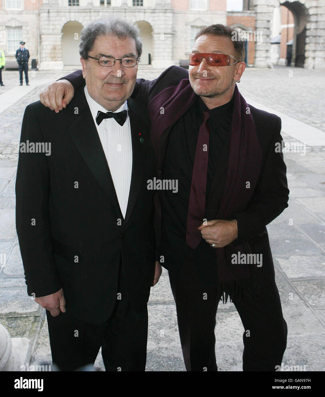 Former SDLP leader John Hume, left and rockstar Bono arrive at Dublin Castle for a gala dinner which forms part of a series of events to mark the 10th anniversary of the Good Friday Agreement. Stock Photo