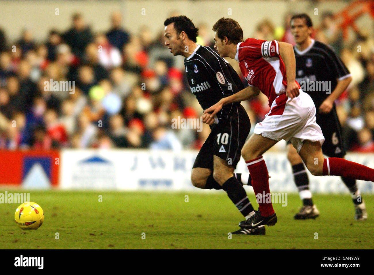 Crystal Palace's Shaun Derry (l) goes past Nottingham Forest's Gareth Williams Stock Photo