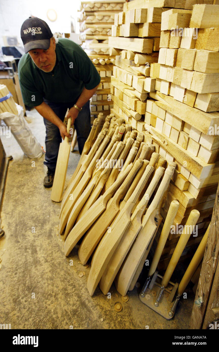 Handmade cricket bat maker Tony Sains at work getting bats ready for