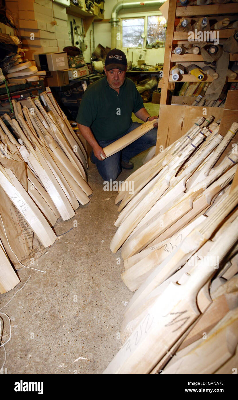 Handmade cricket bat maker Tony Sains at work getting bats ready for