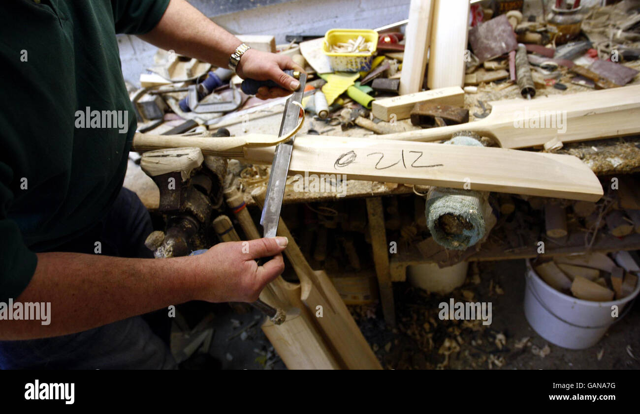 STANDALONE Handmade cricket bat maker Tony Sains at work getting bats