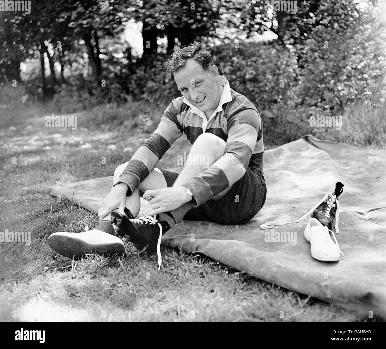 British Lions' Angus Cameron puts on his boots for a training session at Chelmsford Hall School in Eastbourne, shortly before the squad's departure for South Africa. Stock Photo
