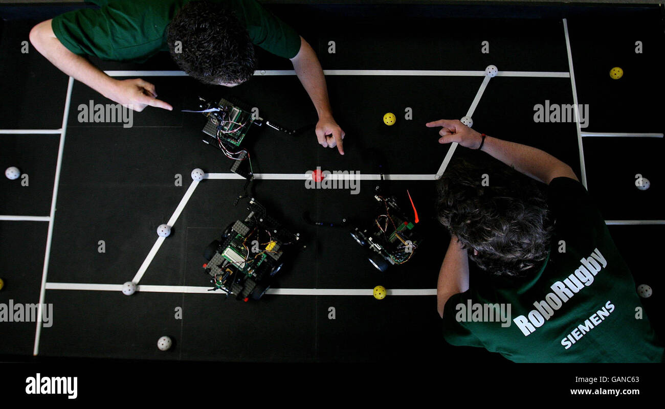 First-year Engineering and Computer Science students, left to right, Oisin O' Murchu and Leo McKeever test their miniature robots before they compete in the Siemens RoboRugby final tonight which will take place in the Clinton Auditorium at University College Dublin. Stock Photo