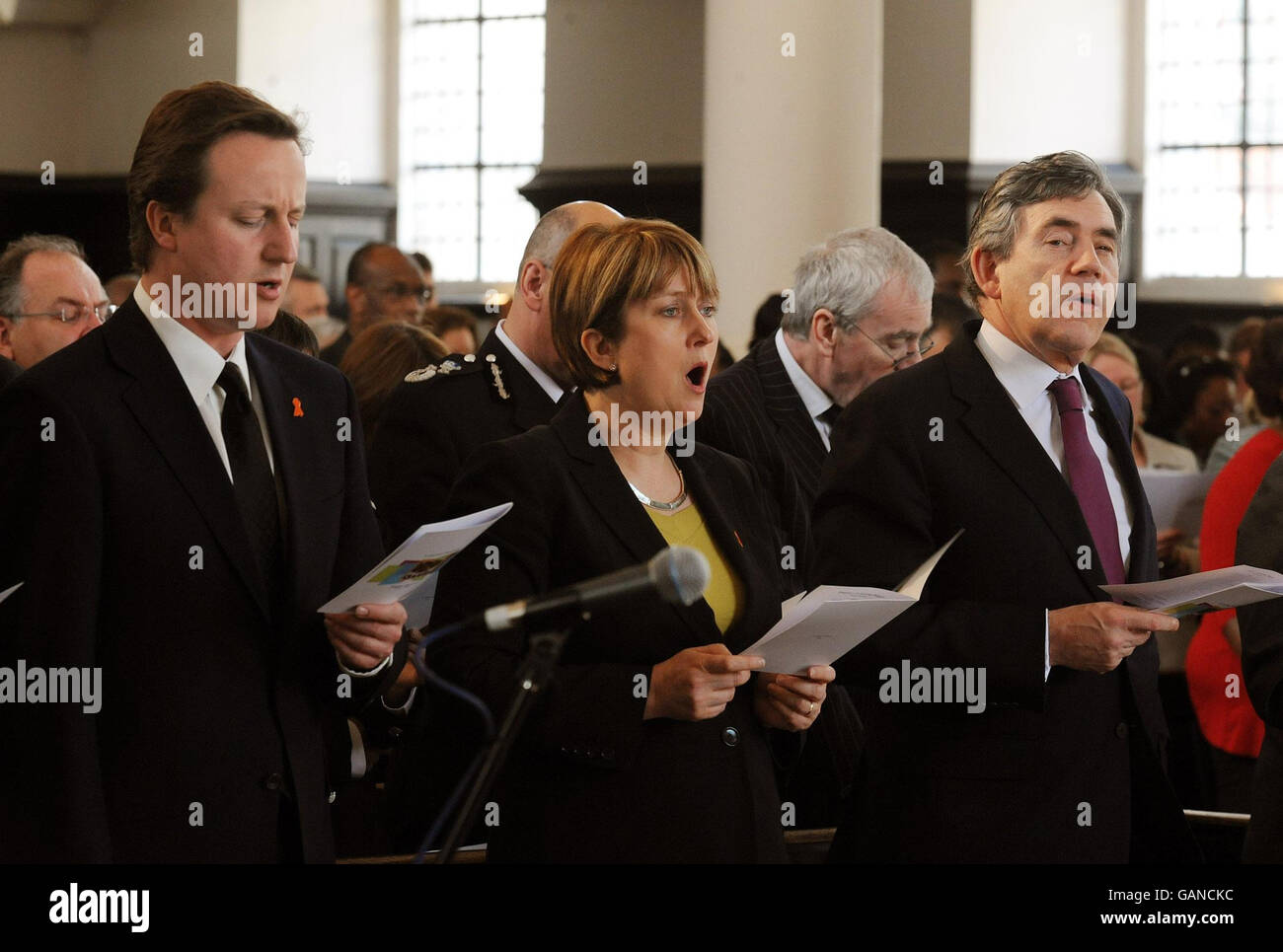Left to right. David Cameron, Conservative Leader, Jacqui Smith, Home Secretary and Prime Minister Gordon Brown sing a hymn during the memorial service for Stephen Lawrence at St Martin's in-the-Fields Church in central London. Stock Photo