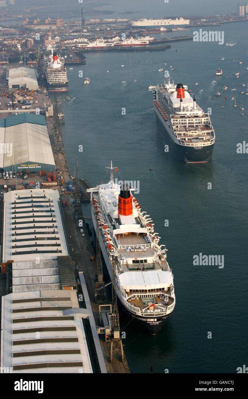 Queen Mary II, right, steams past the other two liners in the Cunard