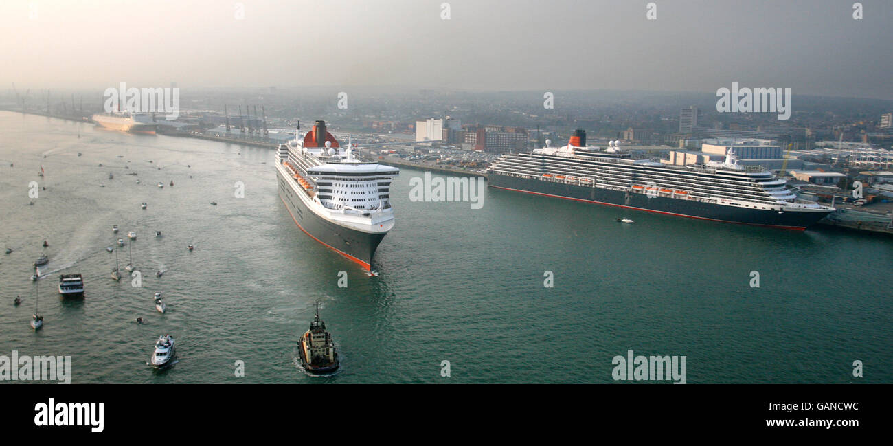 Queen Mary II (centre) steams past the other two liners in the Cunard