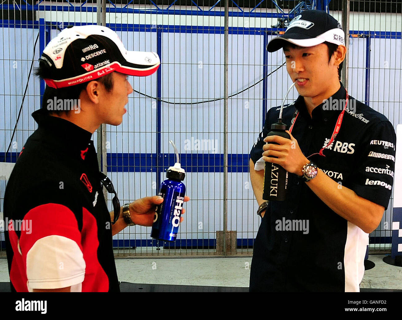 Japan's Super Aguri driver Takuma Sato and Williams driver Kazuki ...