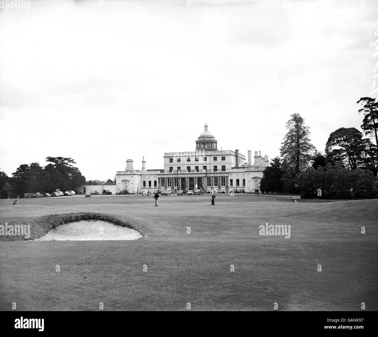 Golf - Stoke Park Golf Club, Stoke Poges. General view of the ninth green, with the clubhouse in the background Stock Photo