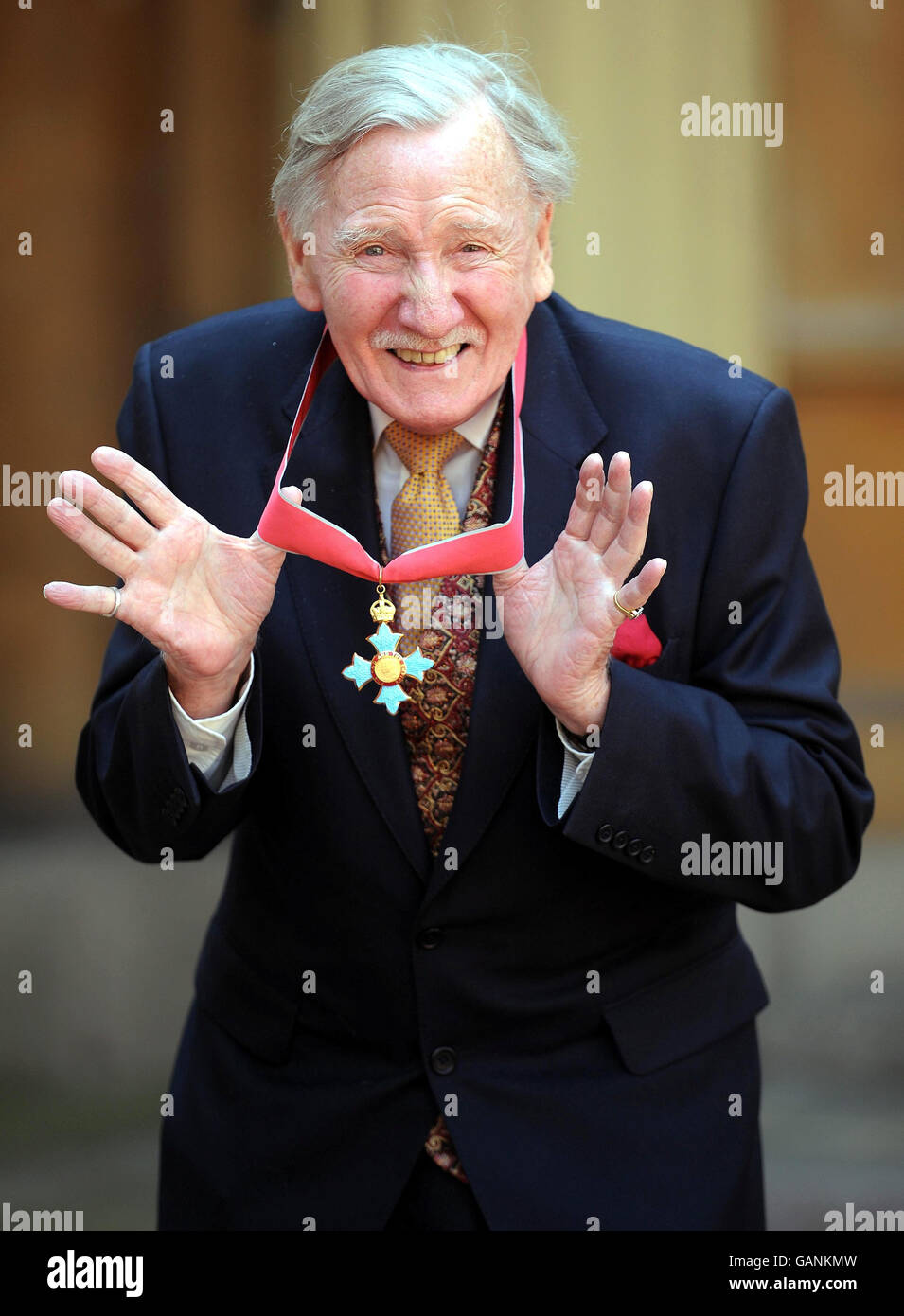 Actor Leslie Phillips with his CBE, which was given to him by Britain's Queen Elizabeth II at Buckingham Palace, London. Stock Photo