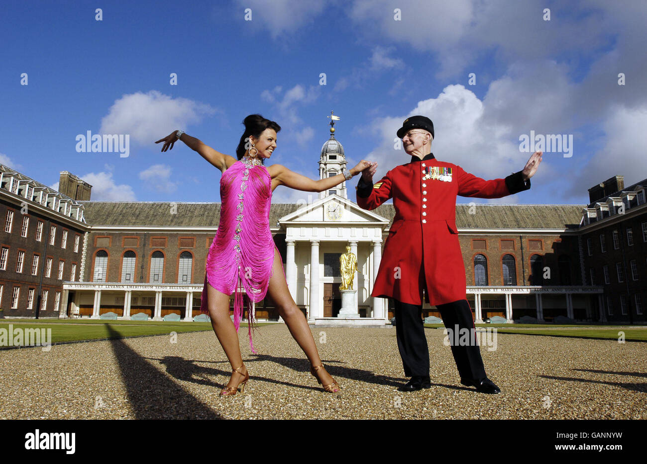 Strictly Come Dancing star Karen Hardy rehearses some dance moves with Chelsea Pensioner Corporal Lewis Prangle, 88, at The Royal Hospital Chelsea, London, to mark the nationwide Anzac Tea Dances in aid of the Royal British Legion. Stock Photo