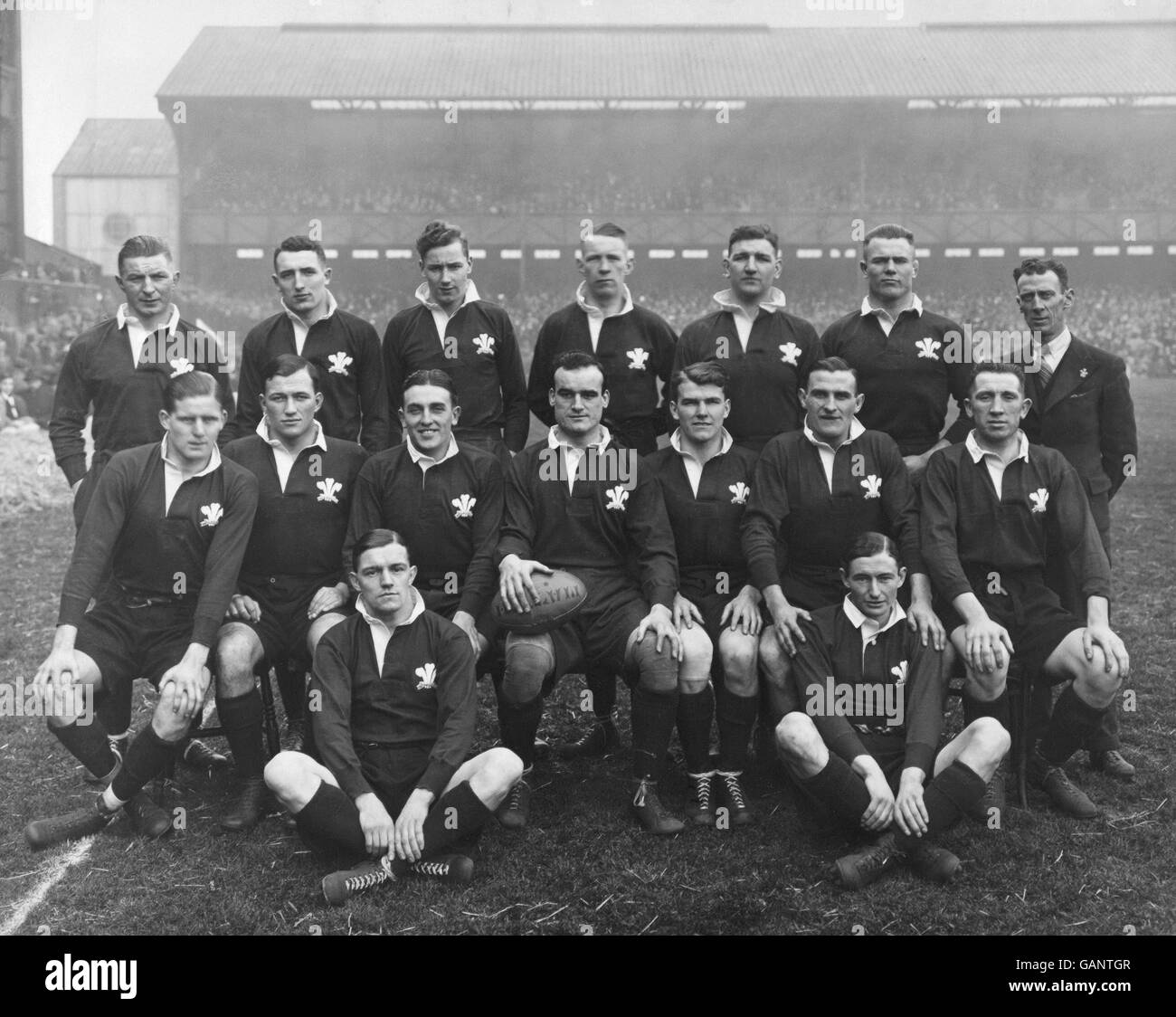 Wales team group: (back row, l-r) Bryn Evans, Viv Jenkins, Wilf Wooller, Iorrie Isaacs, Tom Arthur, B Thomas, touch judge WJ Llewelyn; (front row, l-r) Arthur Jones, Raymond Jones, Ronnie Boon, Watcyn Jones, Claude Davey, Edgar Jones, Archie Skym; (on ground, l-r) Harry Bowcott, Maurice Turnbull. Stock Photo