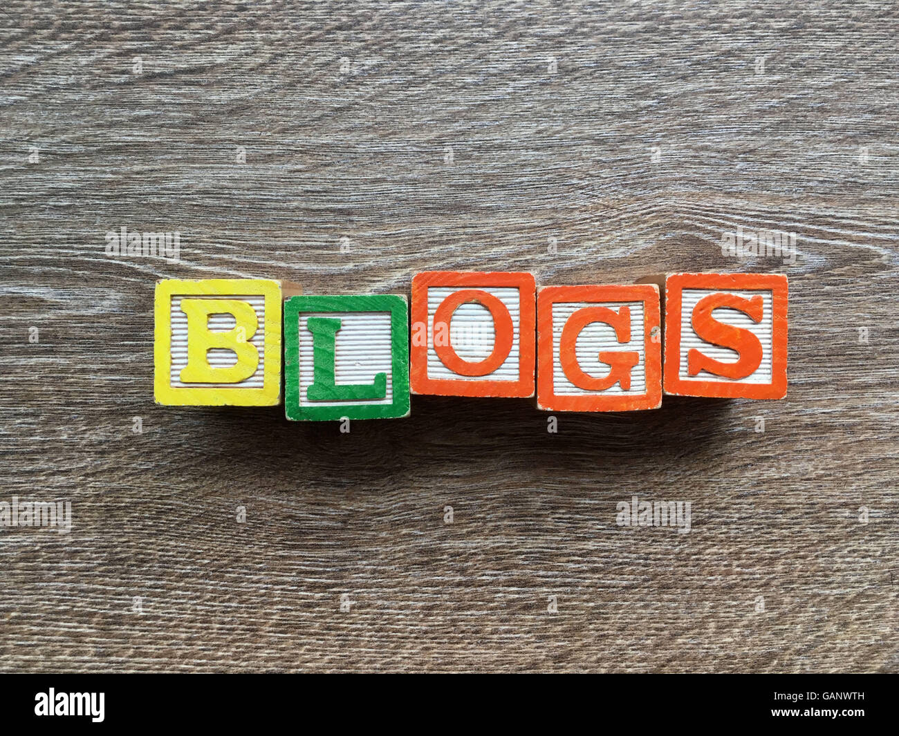 BLOGS word made with toy wood blocks letters Stock Photo