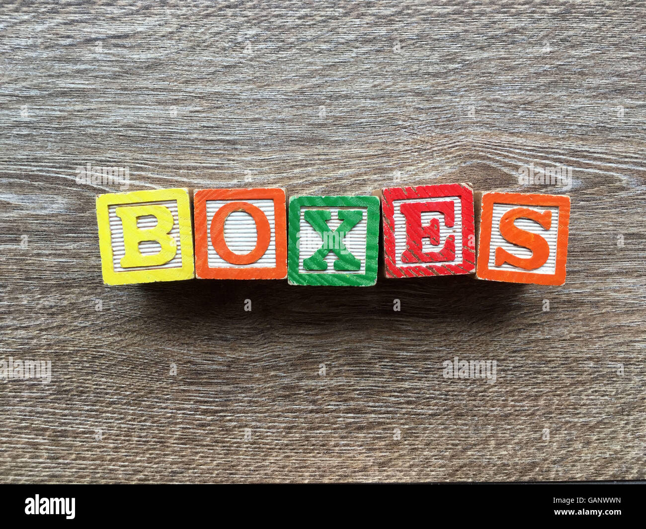 BOXES word made with toy wood blocks letters Stock Photo - Alamy