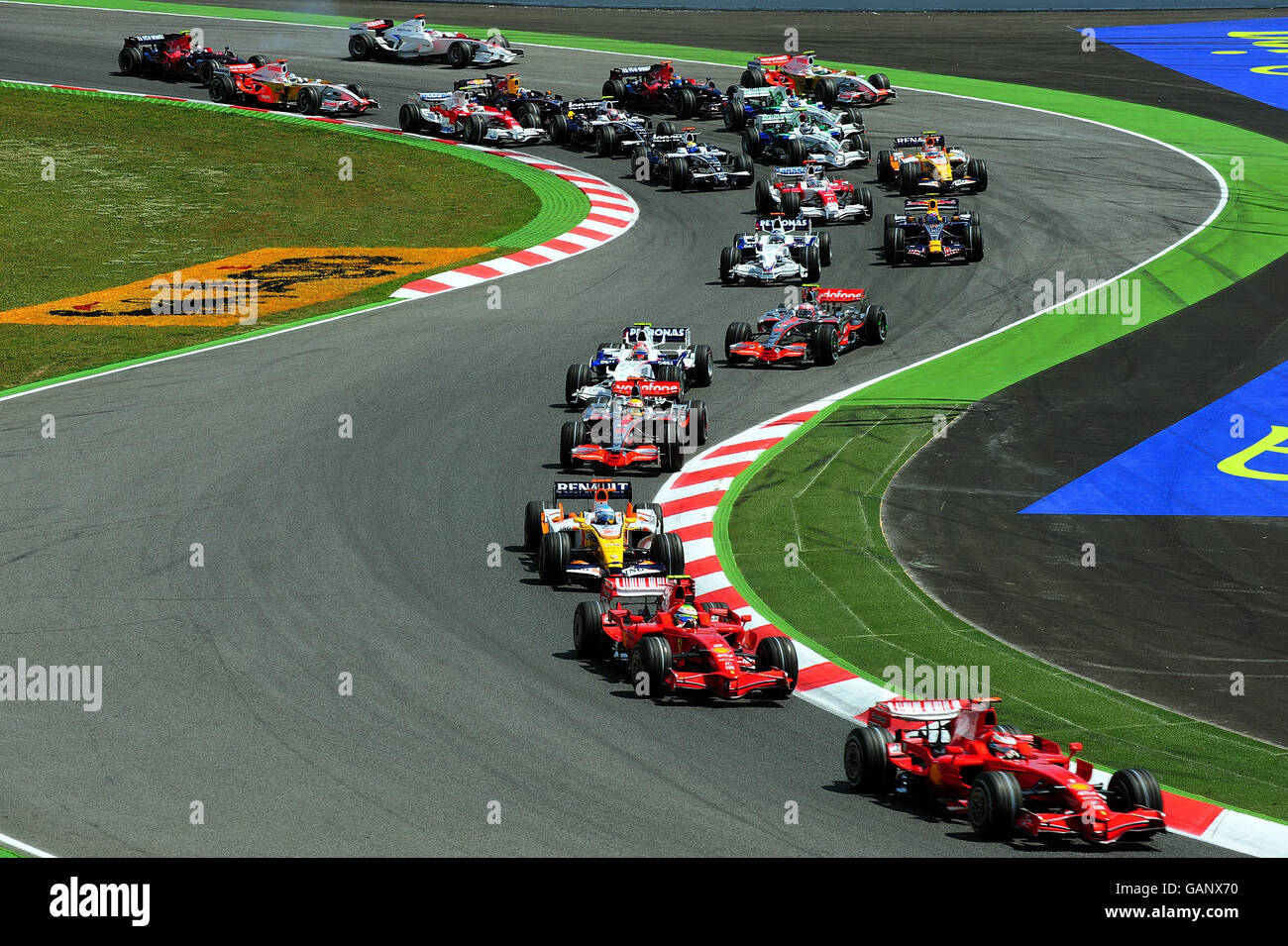 Driver's enter the first and second corners during Spanish Grand Prix ...