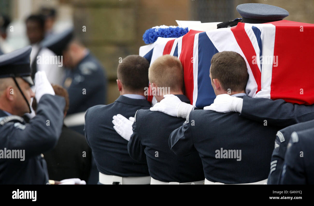 The coffin of Graham Livingstone of the Royal Air Force Regiment is carried during his funeral at Our Lady & St John's church in Blackwood, Lanarkshire, Scotland. Stock Photo
