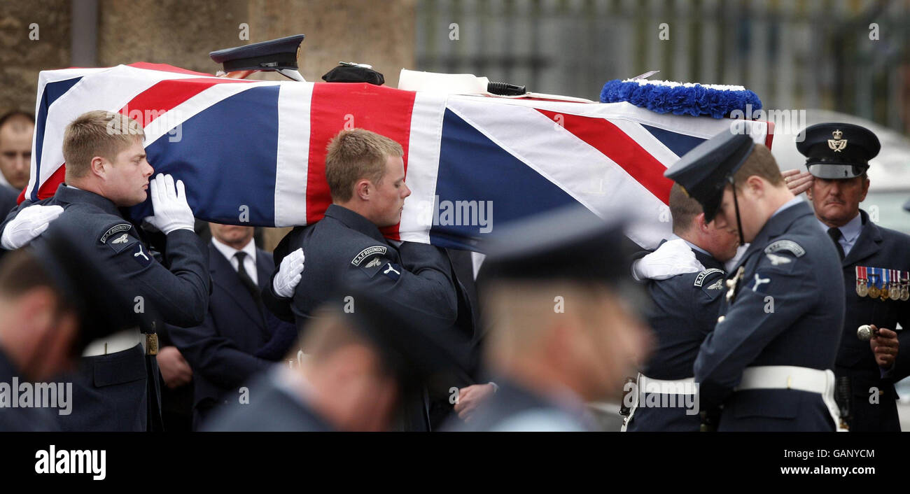 The coffin of Graham Livingstone of the Royal Air Force Regiment is carried during his funeral at Our Lady & St John's church in Blackwood, Lanarkshire, Scotland. Stock Photo