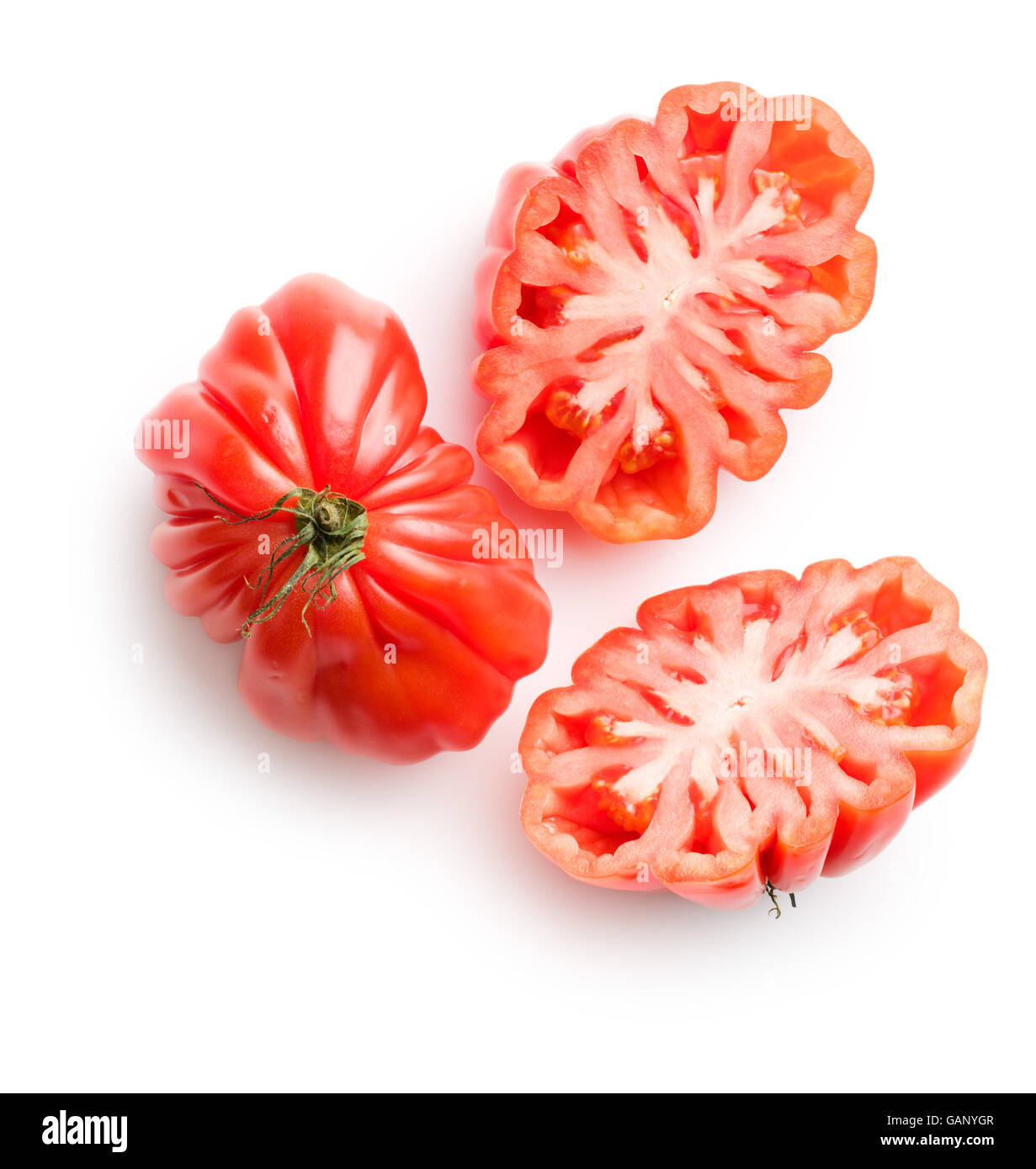 Coeur De Boeuf. Beefsteak tomatoes isolated on white background. Stock Photo