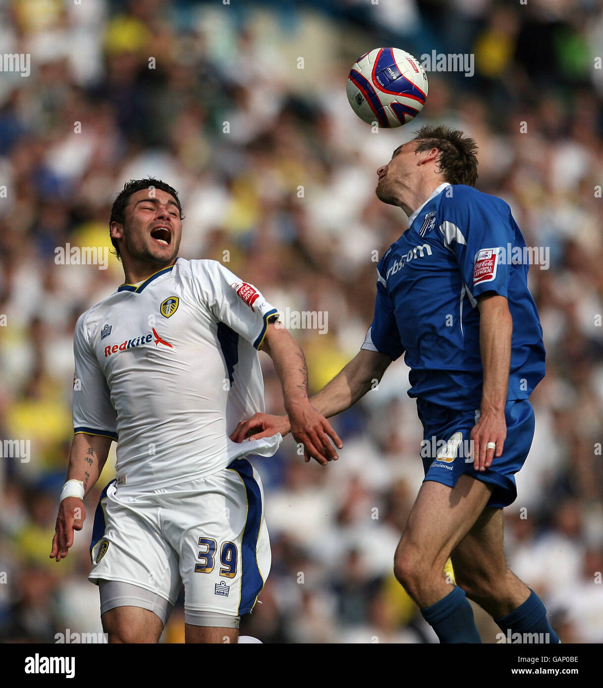 Leeds United's Anthony Elding and Gillingham's Mark Bentley in action during the Coca-Cola League One match at Elland Road, Leeds. Stock Photo