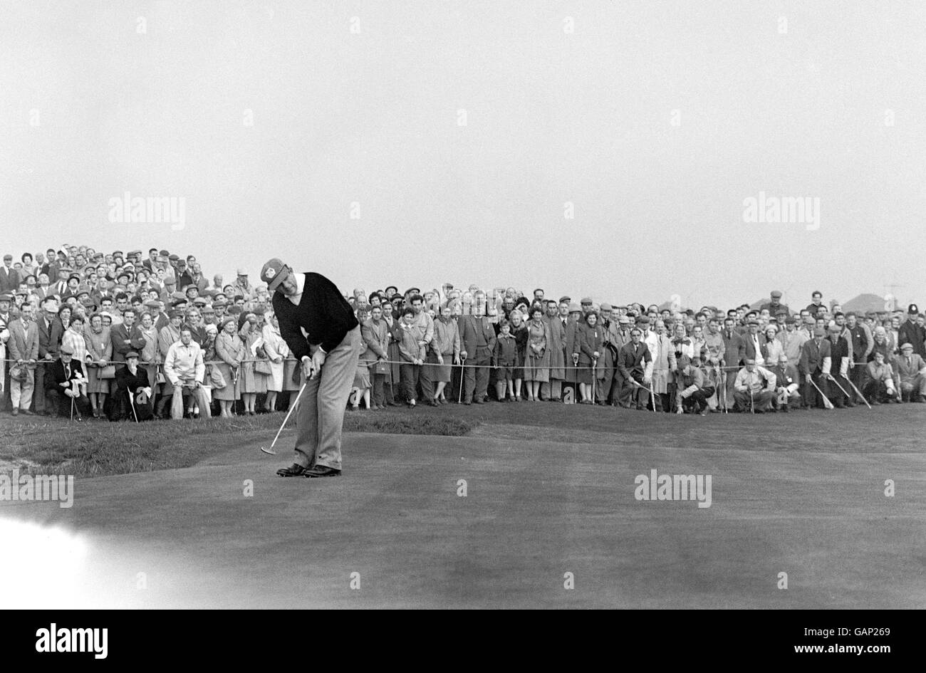 Golf - Ryder Cup - Great Britain and Ireland v USA - Royal Lytham and St Annes. Jay Hebert of the USA playing at the 13th green against Great Britain's Dai rees. Rees won 2 and 1. Stock Photo