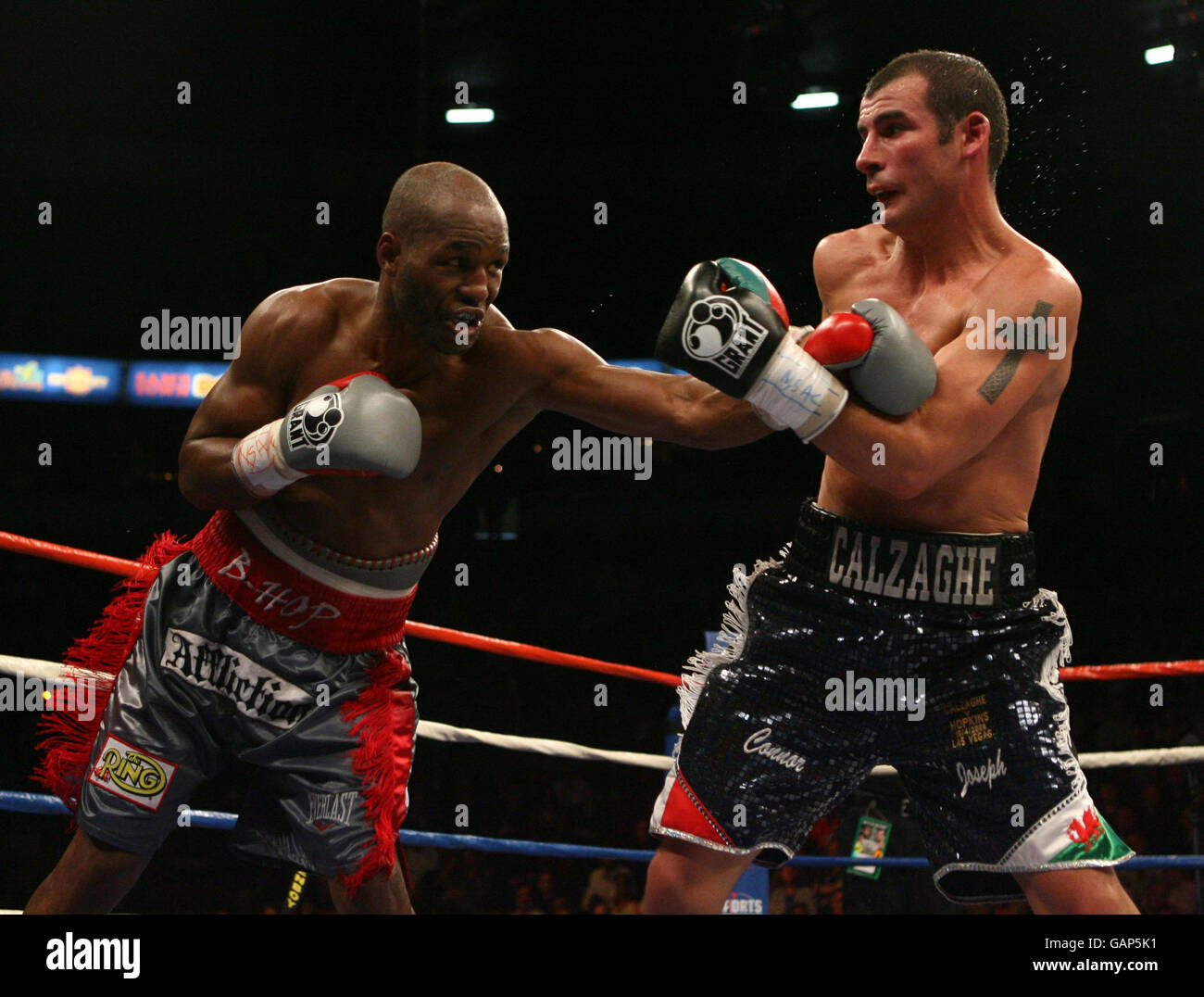 Wales' Joe Calzaghe is punched by left hand of Bernard Hopkins during the Light-Heavyweight Title at Thomas & Mack Center, Las Vegas, USA. Stock Photo
