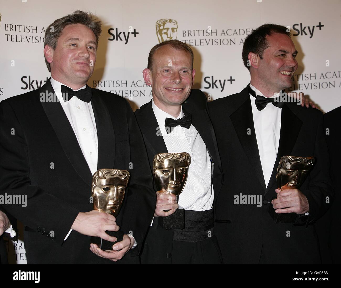 Chris Granlund, Tom Giles, Andrew Marr and Clive Edwards with the Specialist Factual award received for Andrew Marr's History of Modern Britain at the British Academy Television Awards at the London Palladium, W1. PUBLICATION OF THIS IMAGE AND WINNER RESULTS, IN WHATEVER MEDIUM, WHETHER PRINT, BROADCAST OR ONLINE IS UNDER STRICT EMBARGO TIL 2100 GMT SUNDAY 20 APRIL 2008. Stock Photo