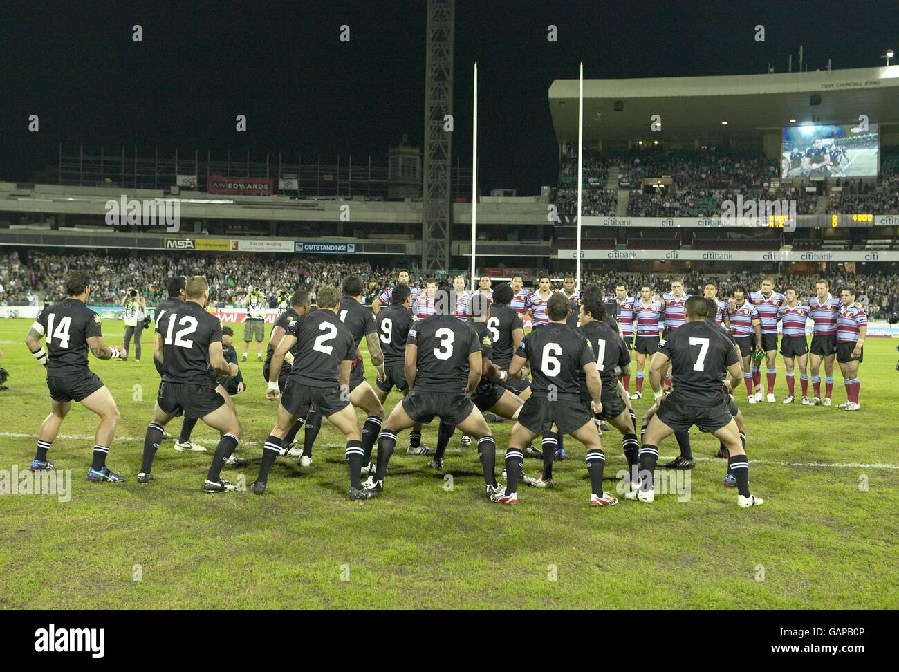 The New Zealand team perform the Haka prior to the match Stock Photo