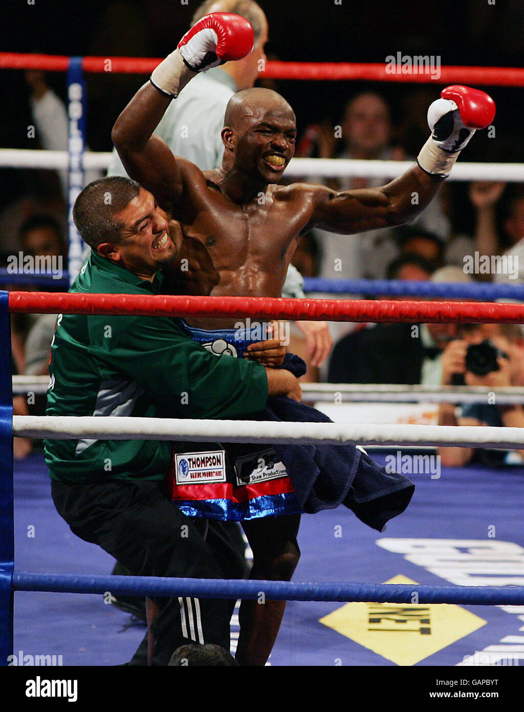 USA's Timothy Bradley celebrates at the end of the 12th round against England's Junior Witter during the WBC Light-Welterweight Title bout at Nottingham Arena. Stock Photo