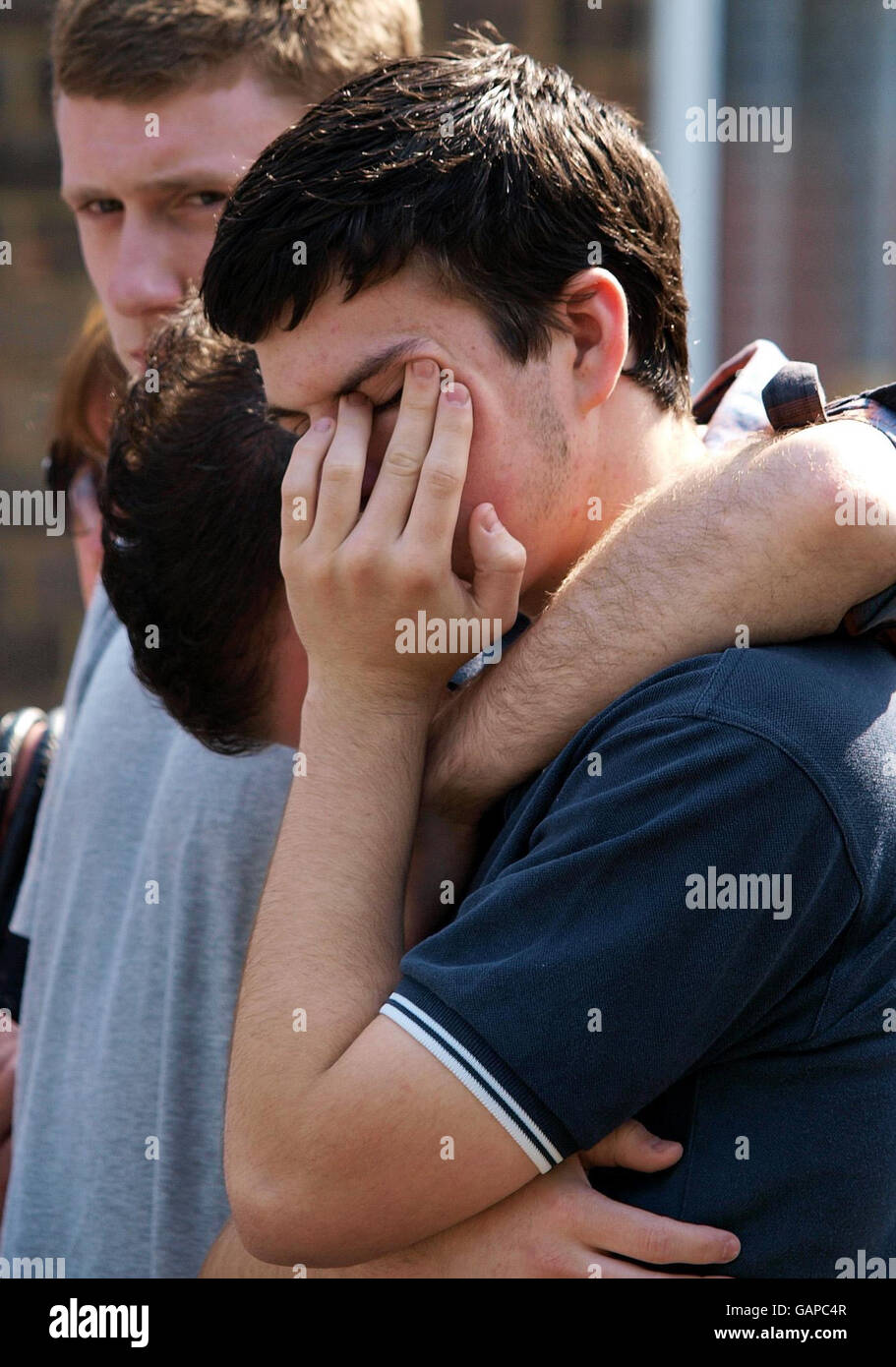 Bobby Mizen, brother of murdered 16yearold Jimmy Mizen, is hugged by
