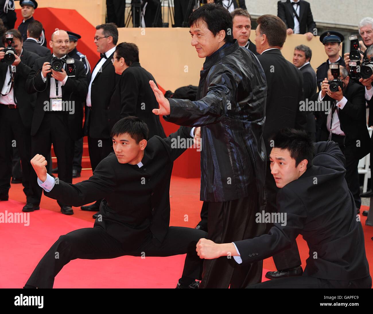 Jackie Chan (centre), Liu Fengchao (r)and Wang Wenjie arrive for the ...