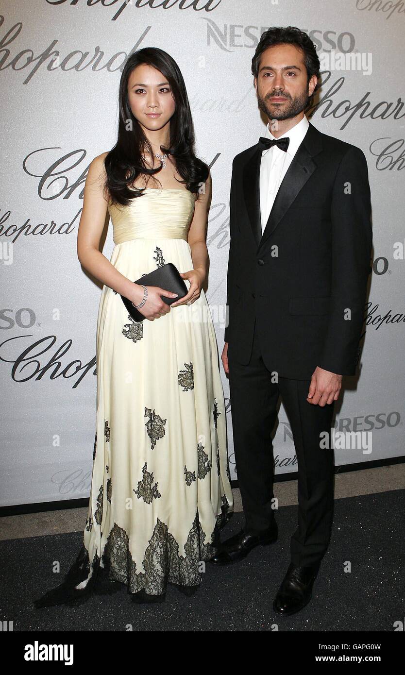 AP OUT Tang Wei and Omar Metwally arrive at the Chopard Trophy Caremony at the Carlton Hotel in Cannes, France. Stock Photo