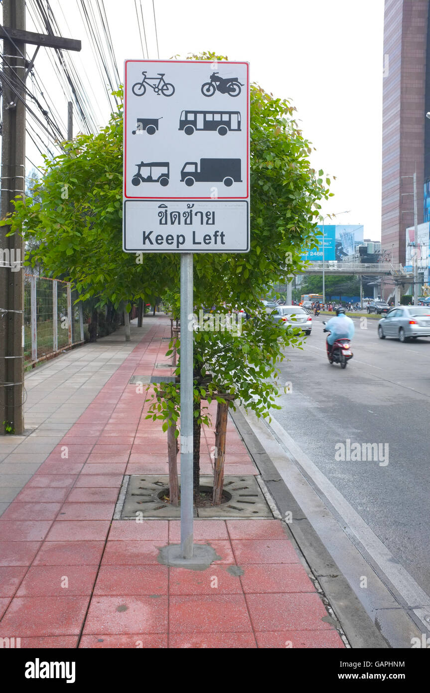 Traffic sign of vehicle on road pavement Stock Photo - Alamy