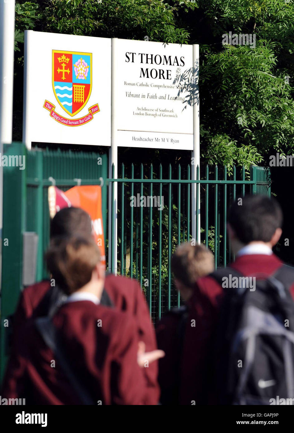 A group of pupils arrive at the St Thomas More School in Eltham south