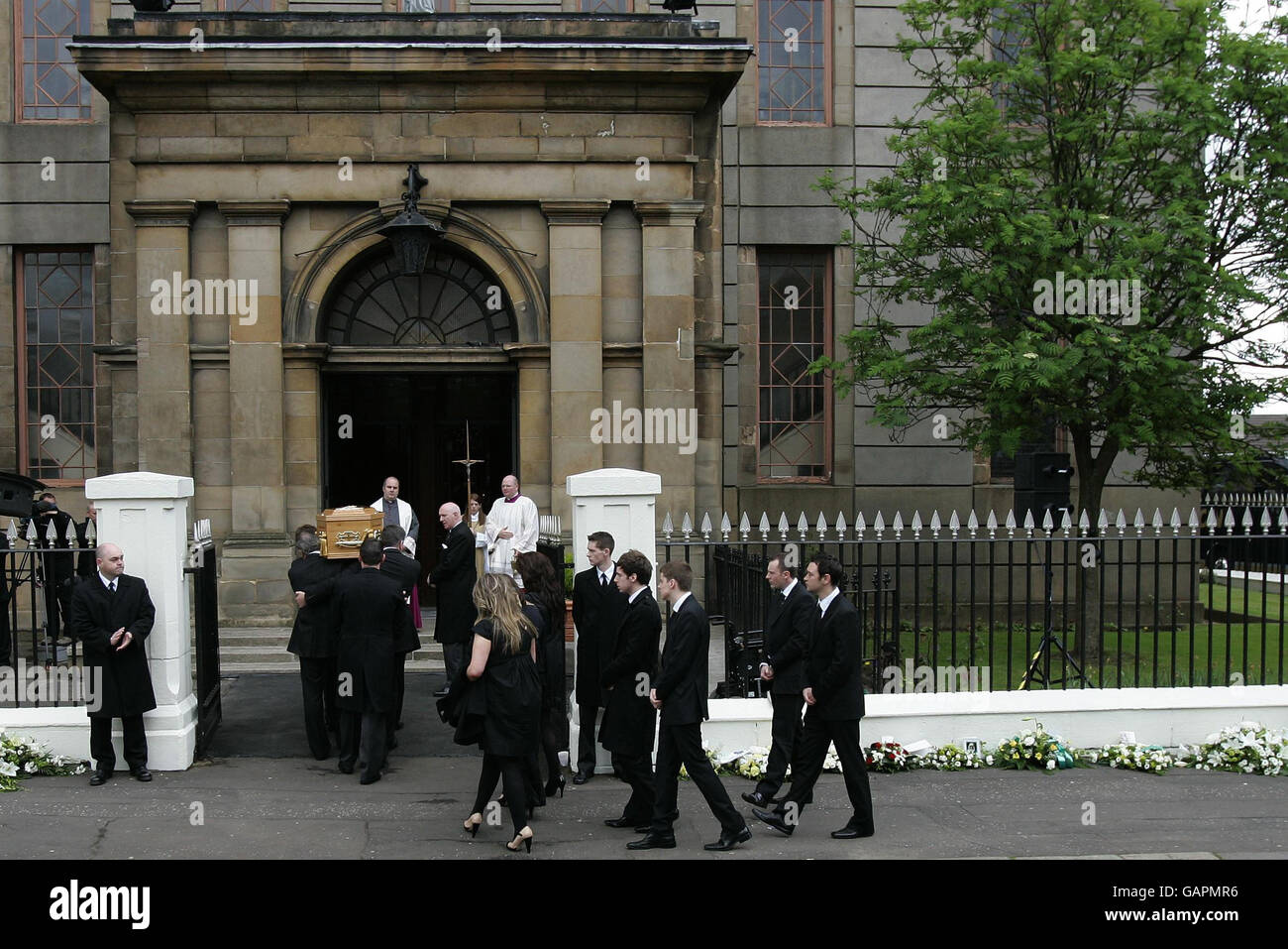 Tommy Burns coffin is carried into St. Mary's Church, Abercromby Street