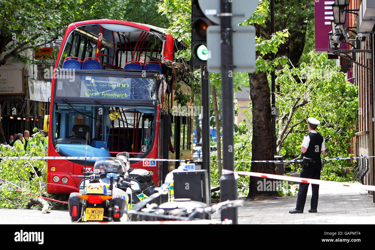 Police officers at the scene of an accident involving a bus at the