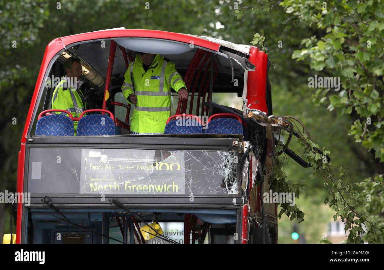 Police officers at the scene of an accident involving a bus at the