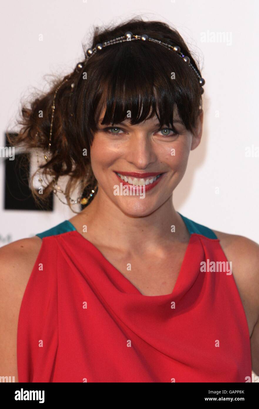 Milla Jovovich arrives for the amfAR Gala during the 61st Cannes Film