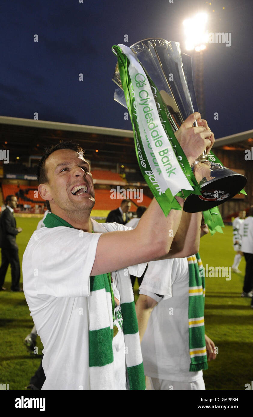 Celtic's Jan Vennegoor of Hesselink lifts the trophy as he celebrates winning the Clydesdale Celtic's Jan Vennegoor of Hesselink lifts the trophy as he celebrates winning the Clydesdale