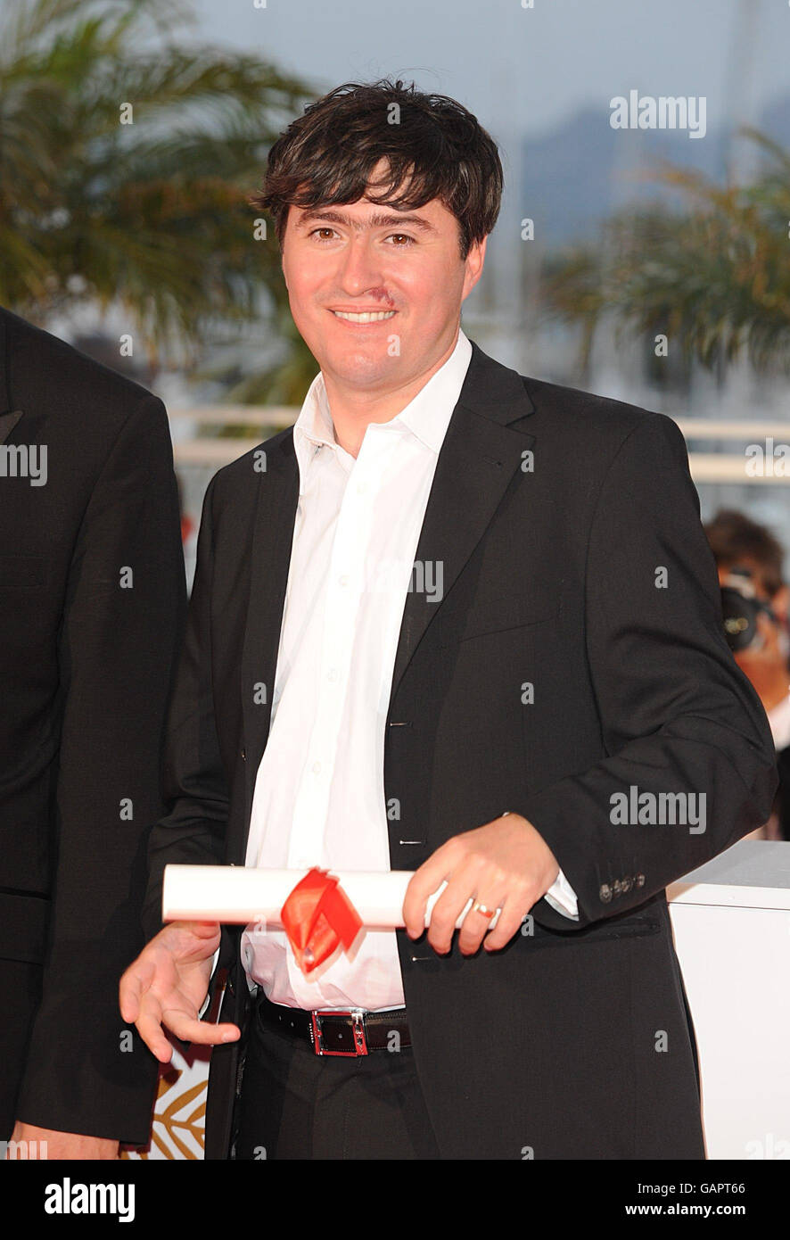 Marian Crisan with the Palme d'Or for the Best Short Film for 'Megatron' during the Palme d'Or Closing Ceremony at the Palais des Festivals the 61st Cannes Film Festival in Cannes, France. Stock Photo