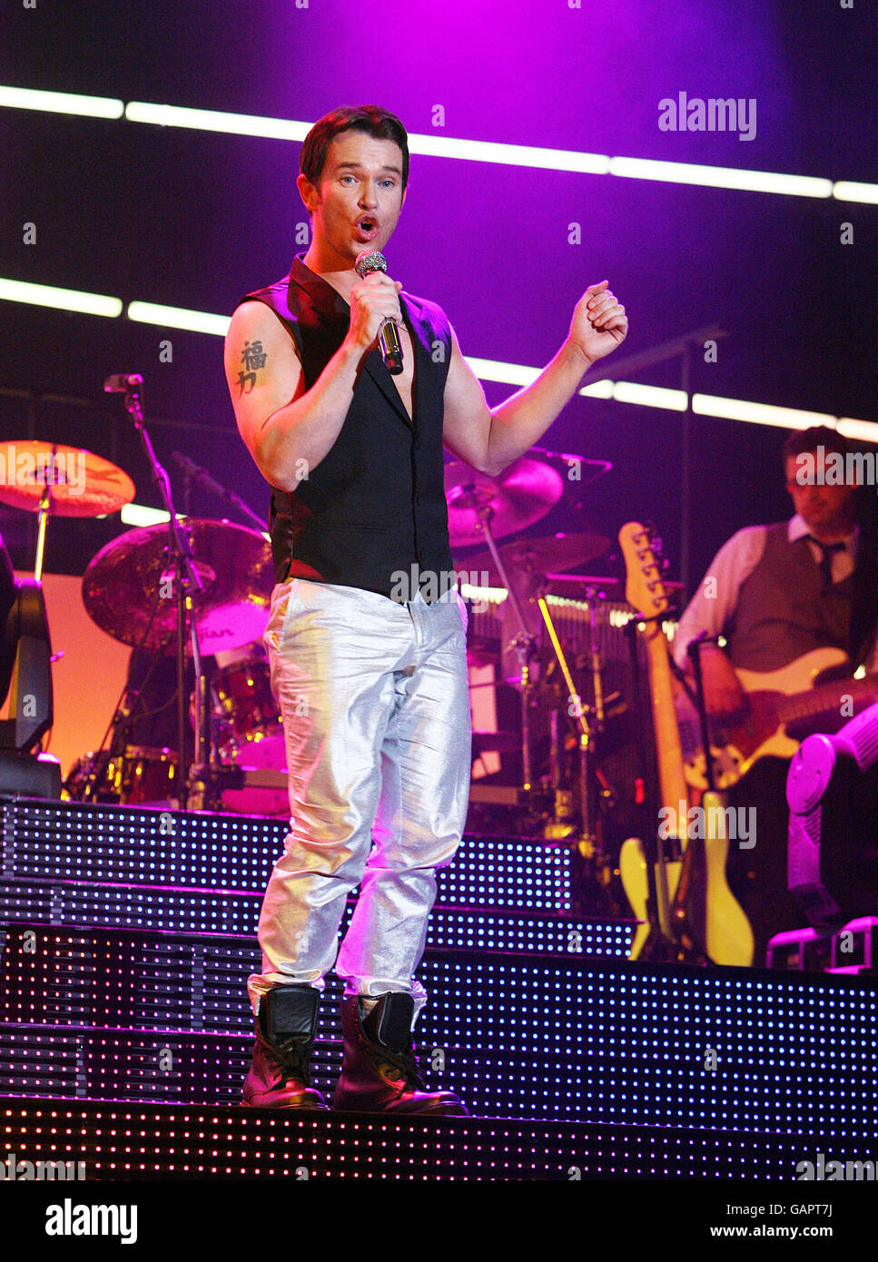 Boyzone Concert. Stephen Gately of Boyzone performs live in concert at the Odyssey Arena Belfast. Stock Photo