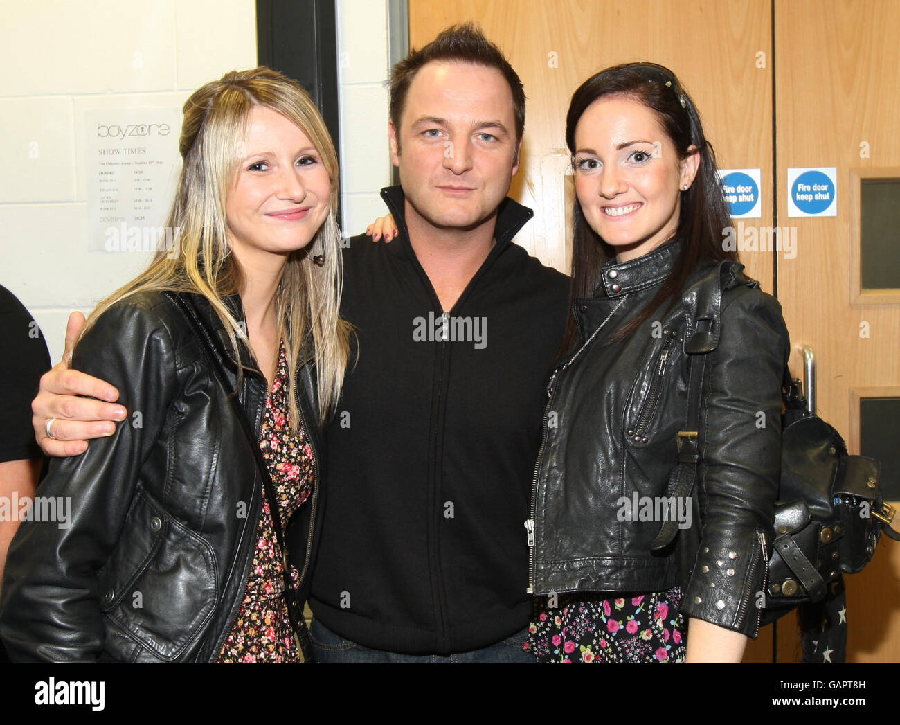 Mikey Graham of Boyzone backstage with fans after performing at the Odyssey Arena Belfast. Stock Photo