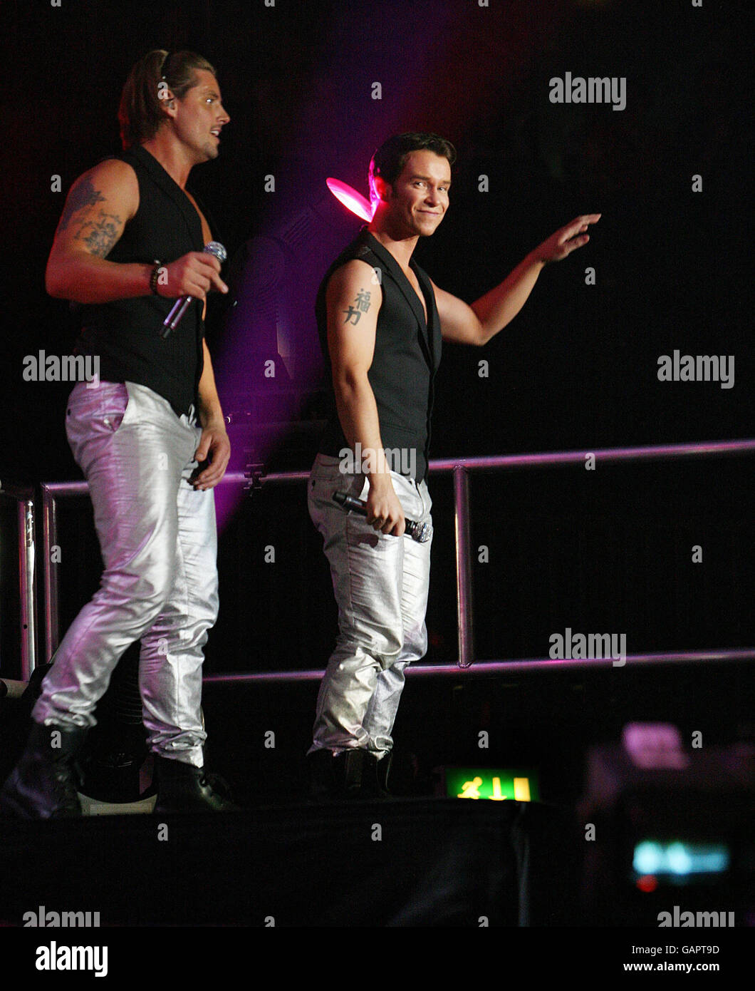 Keith Duffy and Stephen Gately Boyzone perform live in concert at the Odyssey Arena Belfast. Stock Photo