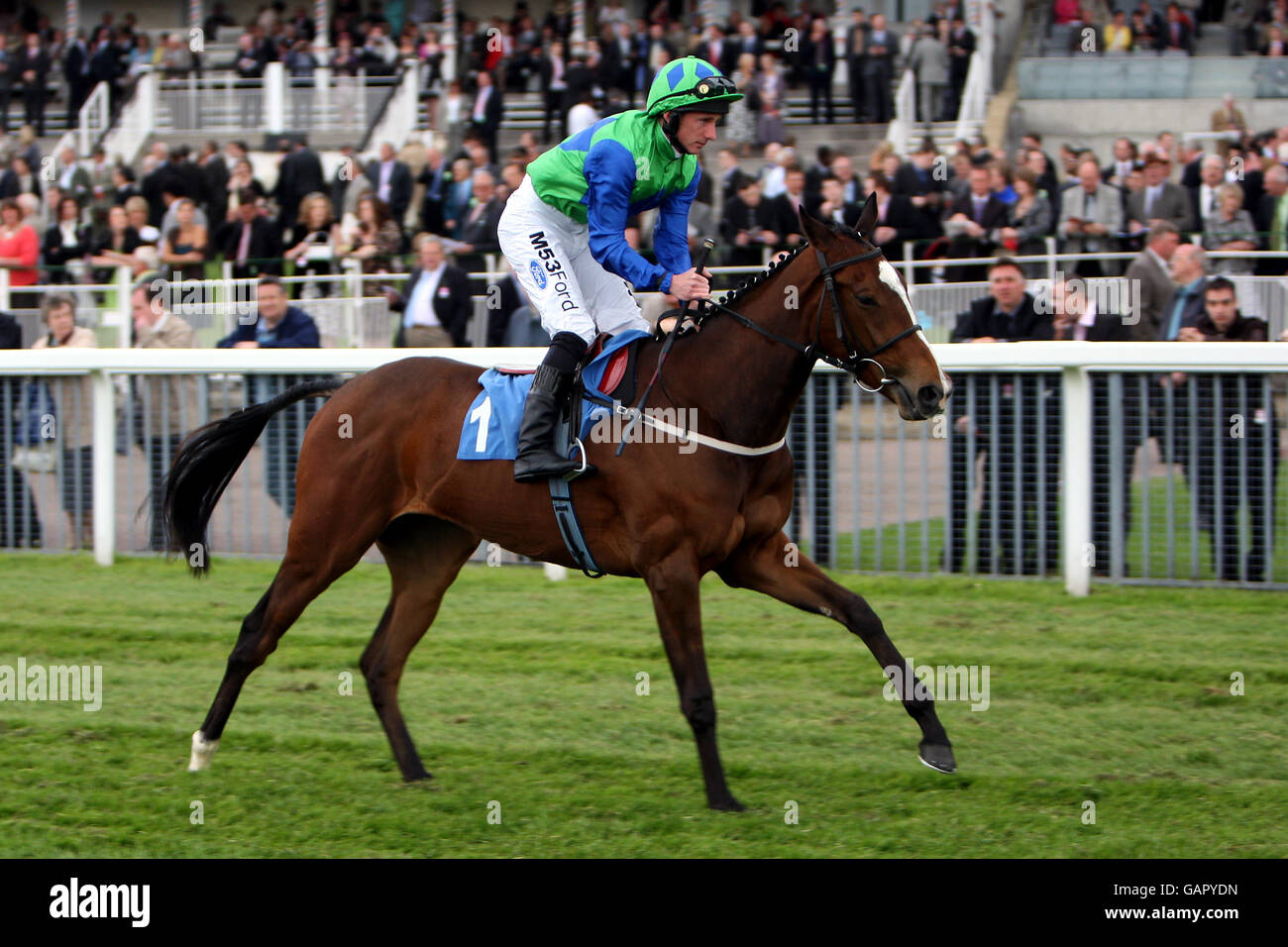 Aspen Darlin ridden by jockey Paul Hanagan competes in the Emirates Airline Yorkshire Cup at York racecourse Stock Photo