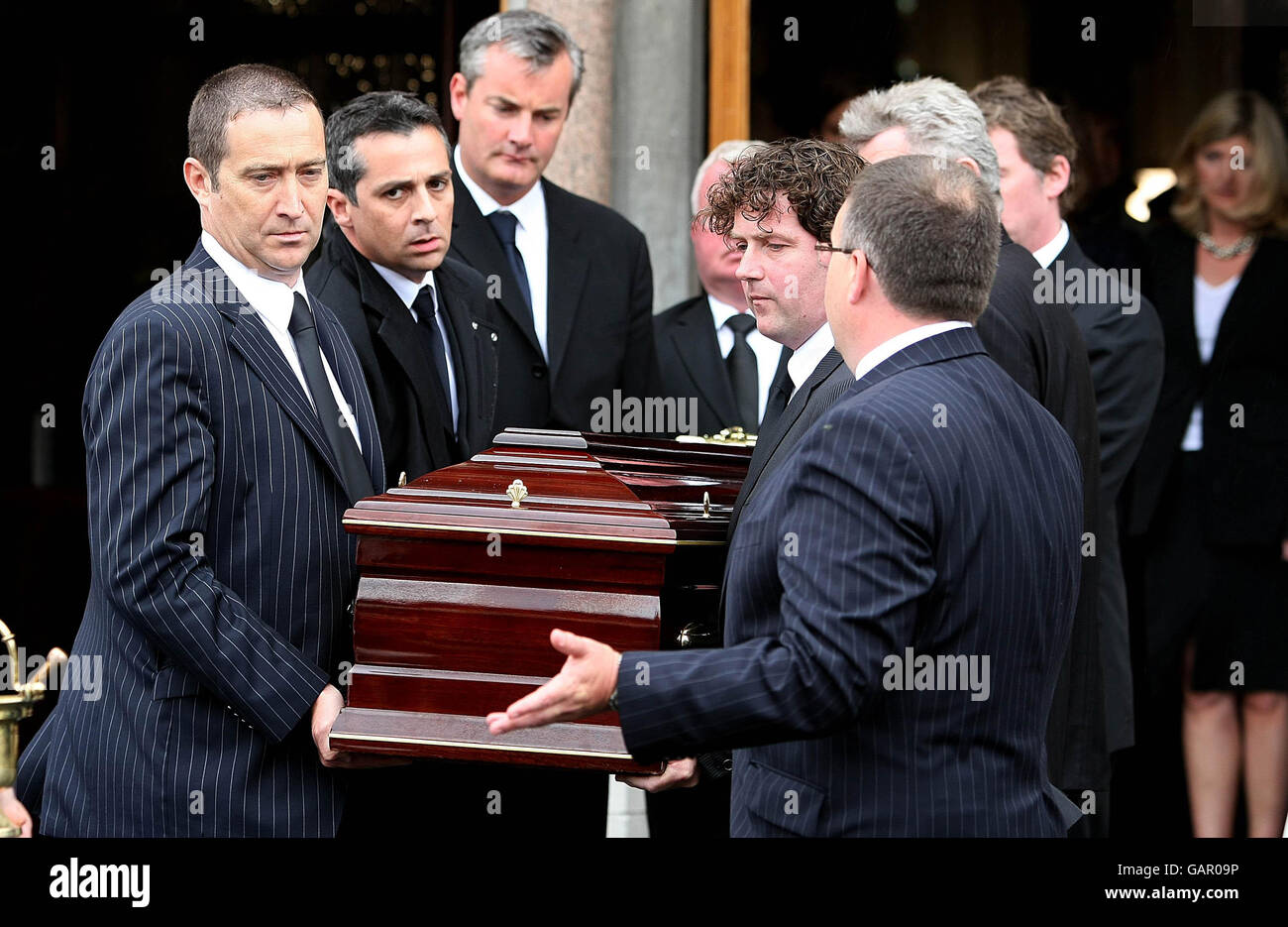The funeral of journalist Terry Keane, as mourners carry her coffin including Keane's son-in-law, celebrity gardener Diarmuid Gavin (second, right) at St.Joseph's Chrurch in Glasthule, Dublin. Stock Photo