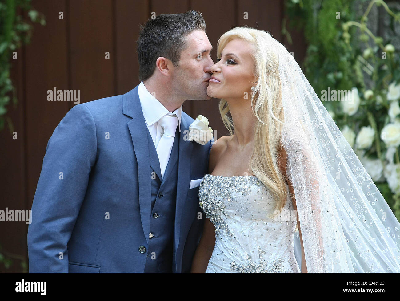 Republic of Ireland and Tottenham Hotspur player Robbie Keane marries his sweetheart, top Irish model Caludine Palmer in a celebrity studded wedding at St. Alphonsus and Columba Church in Ballybrack, Dublin. Stock Photo