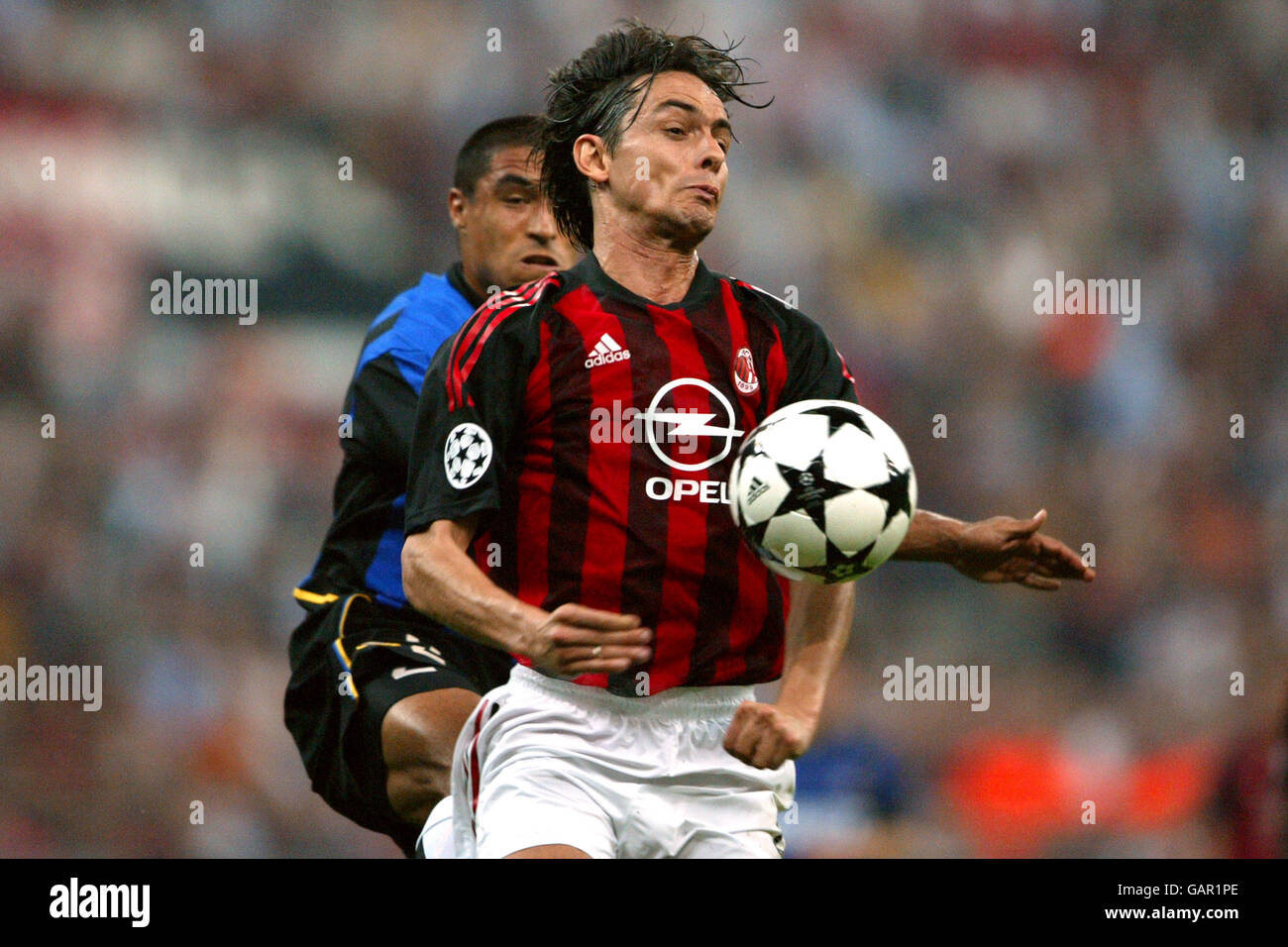 Inter Milan's Ivan Cordoba and AC Milan's Filippo Inzaghi battle for the ball Stock Photo