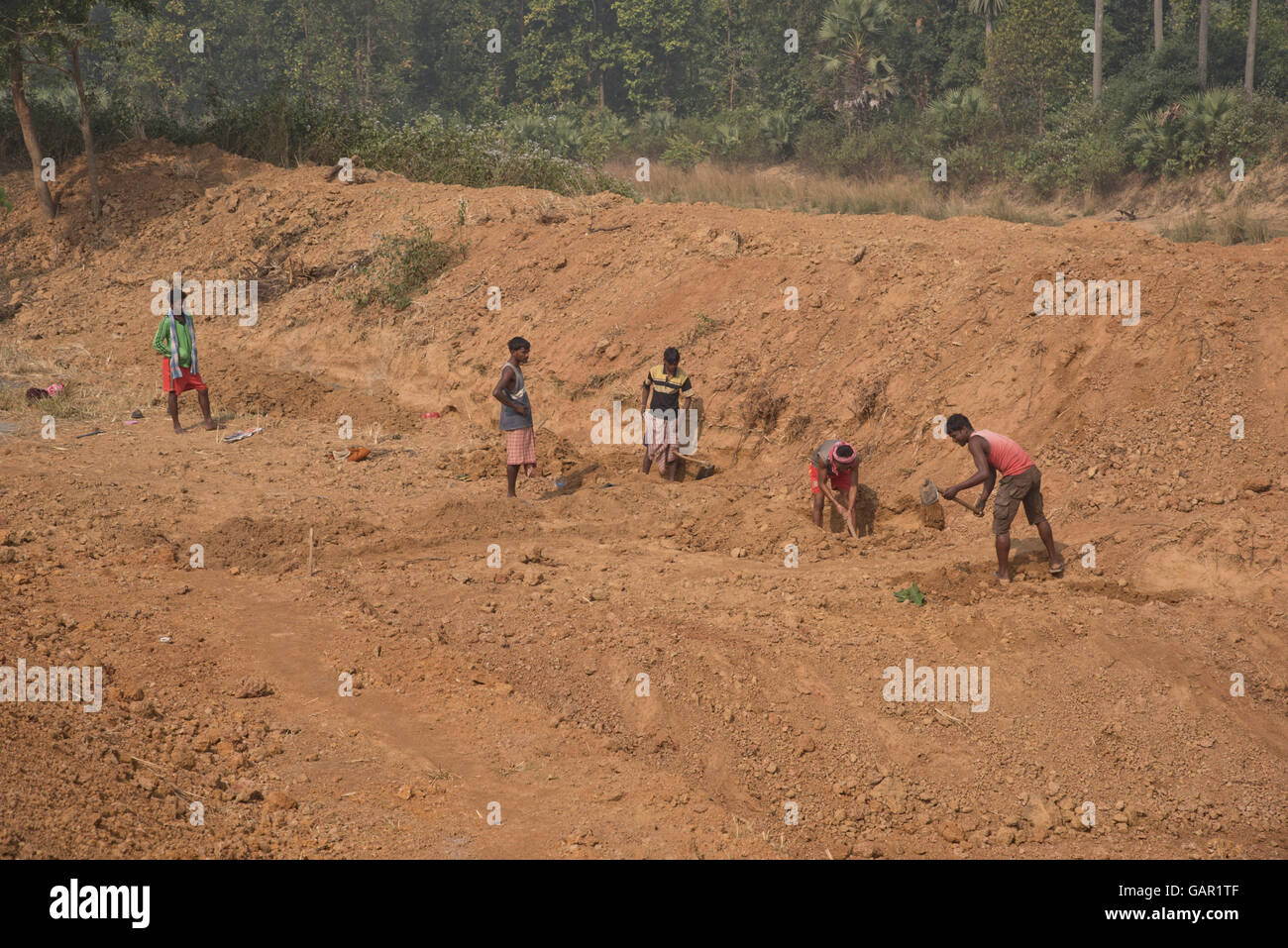 People building a reservoir in a water irrigation project in a rural