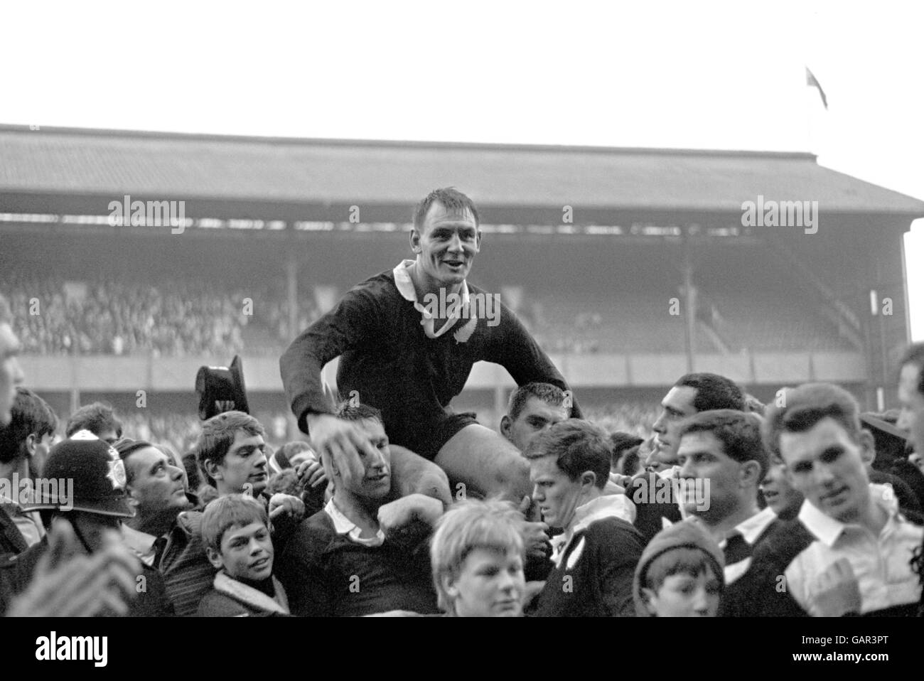 New Zealand captain Brian Lochore is chaired off by his triumphant