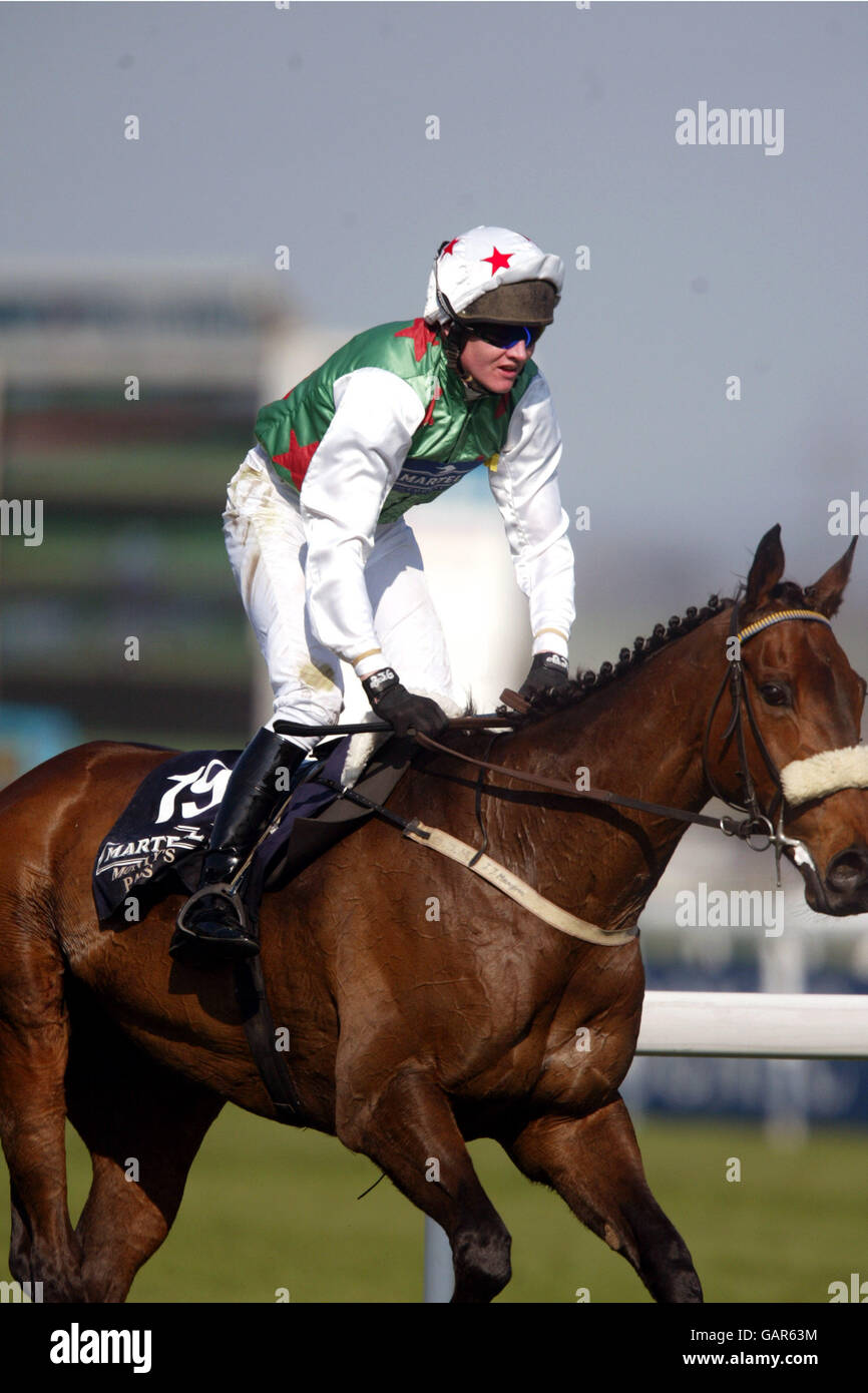 Horse Racing - The Martell Grand National Meeting 2003 - Aintree. Monty's Pass ridden by Barry Geraghty Stock Photo
