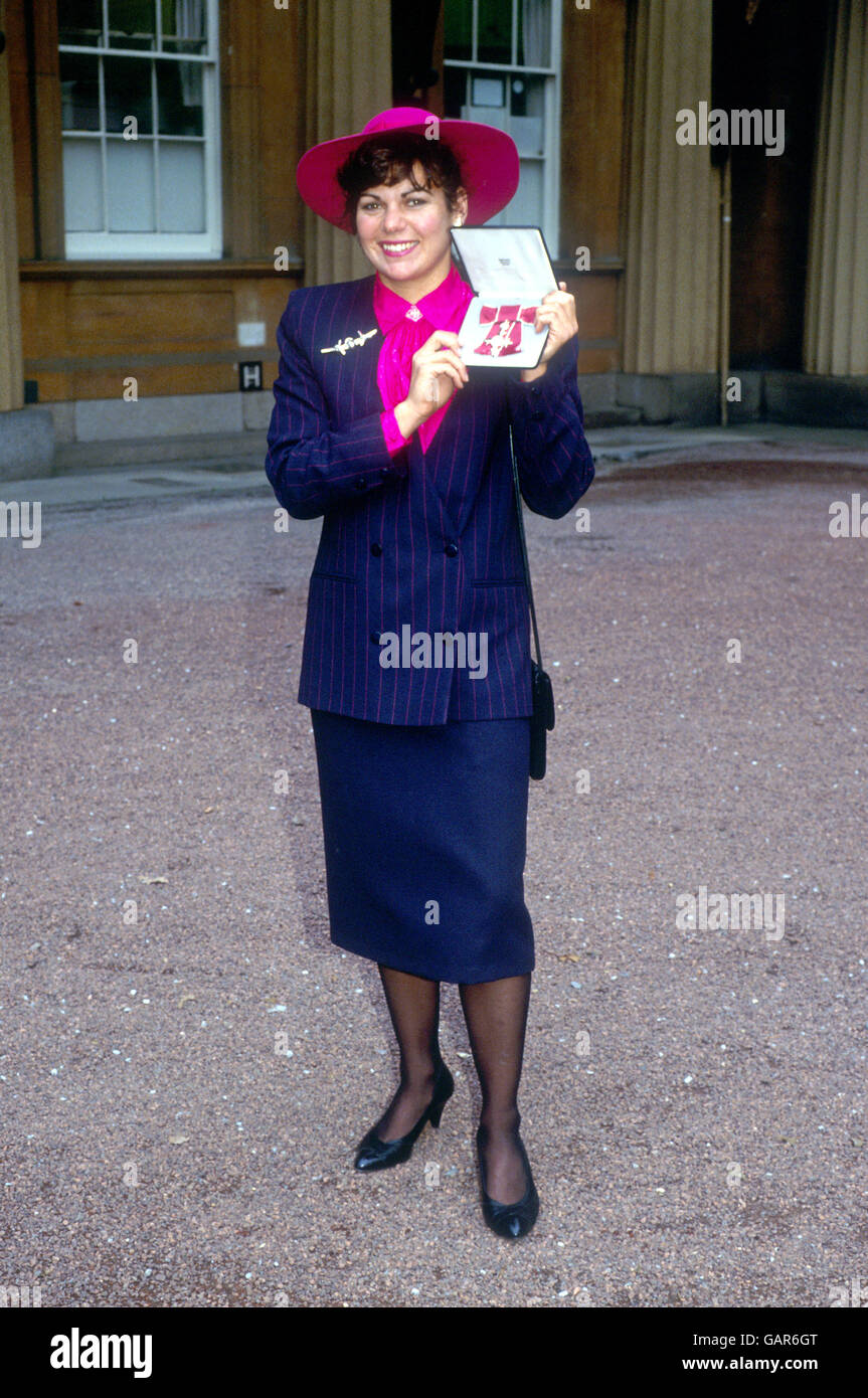 Judy Leden shows off her OBE, awarded for her achievements in competitive hang gliding Stock Photo
